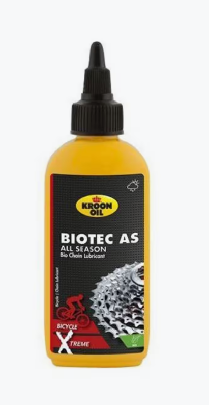 Frasco amarelo de óleo para bicicletas com rótulo preto e amarelo
