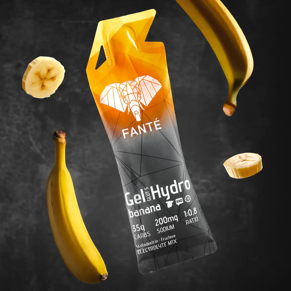 Pacote laranja e preto de gel energético Gel Hydro sabor banana com um elefante branco desenhado.