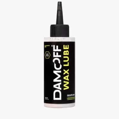 Frasco de lubrificante Damcoff Wax Lube com rótulo preto e detalhes amarelos