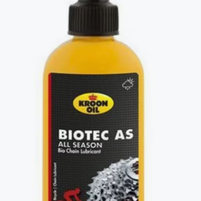 Frasco amarelo de óleo para bicicletas com rótulo preto e amarelo