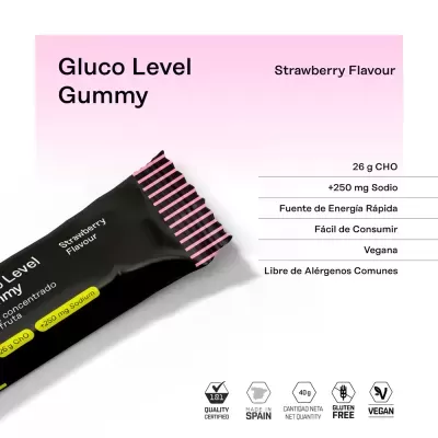 Barra de goma preta com detalhes rosa rotulada Gluco Level Gummy Strawberry Flavour com informações nutricionais e certificados em fundo rosa
