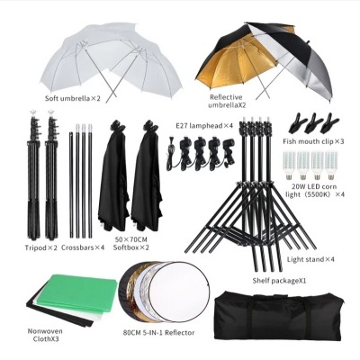 conjunto completo de equipamento de estúdio fotográfico incluindo guarda-chuvas, luzes, tripés, softboxes e refletores