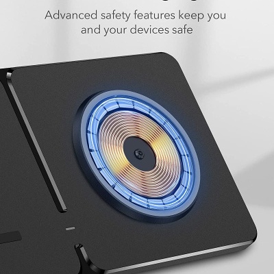 Dispositivo de carregamento sem fios preto com luz azul e laranja e texto de segurança