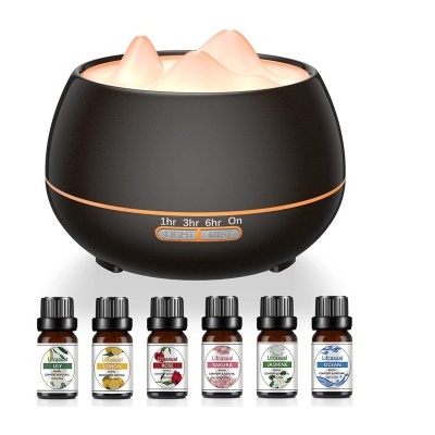 Difusor de aroma preto com luzes e seis frascos pequenos de óleos essenciais