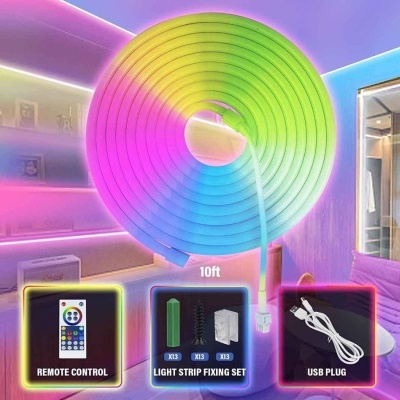 Fita de luz LED colorida em espiral com controlo remoto, fixações e ficha USB num ambiente moderno