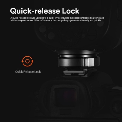 Câmara fotográfica preta com sistema de bloqueio de libertação rápida e texto informativo em inglês.