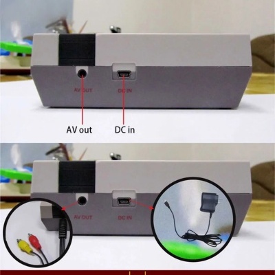 dispositivo eletrónico cinzento com portas AV OUT e DC IN, cabo AV e adaptador de corrente