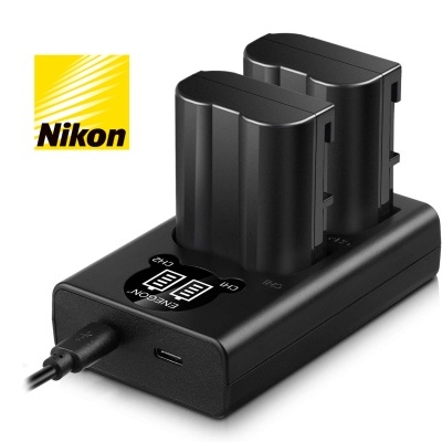Carregador de bateria duplo preto com duas baterias e logótipo Nikon amarelo