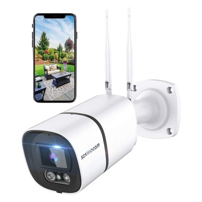 Câmara de segurança wireless branca com smartphone a mostrar imagem de jardim