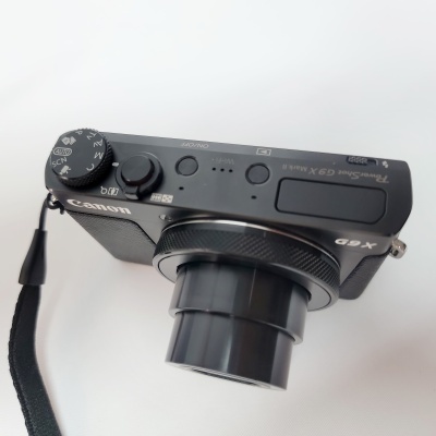 Câmara fotográfica digital Canon PowerShot G9 X preta com lente estendida