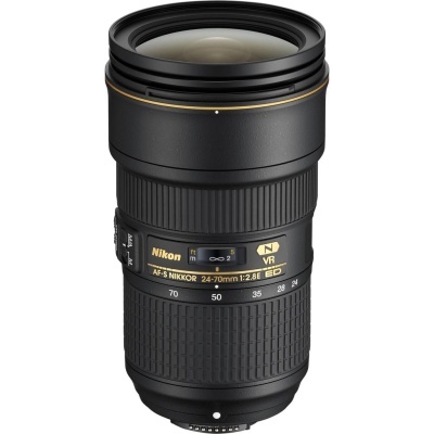 Lente de câmera Nikon preto com texto dourado e branco