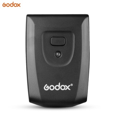 Dispositivo eletrônico preto Godox com botão central e luz LED