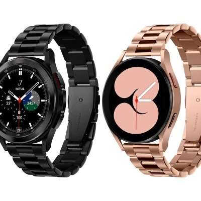 Dois relógios inteligentes metálicos, um preto e outro dourado rosa, com mostradores digitais diferentes