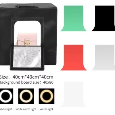 caixa de fotografia portátil em tecido preto com fundos coloridos e opções de luz