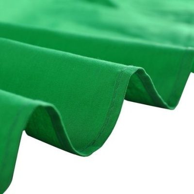 Tecido verde em espiral com costura na borda