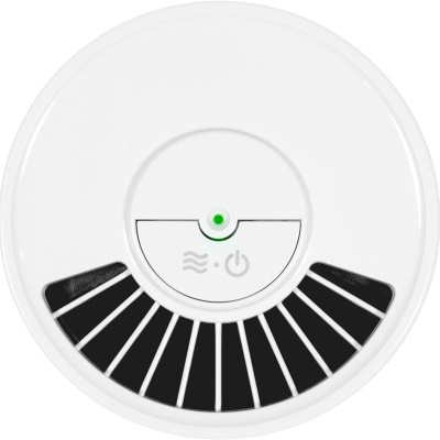 Detector circular branco com grelha preta e indicador verde