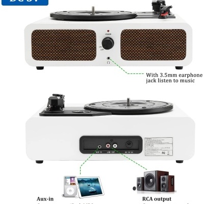 Prato giratório branco com superfícies em relevo castanho e conectores de áudio