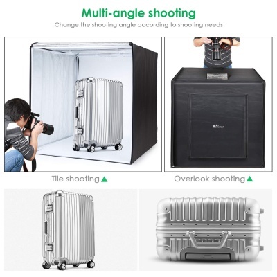 Cubo de fotografia portátil preto com interior branco e mala de viagem prateada