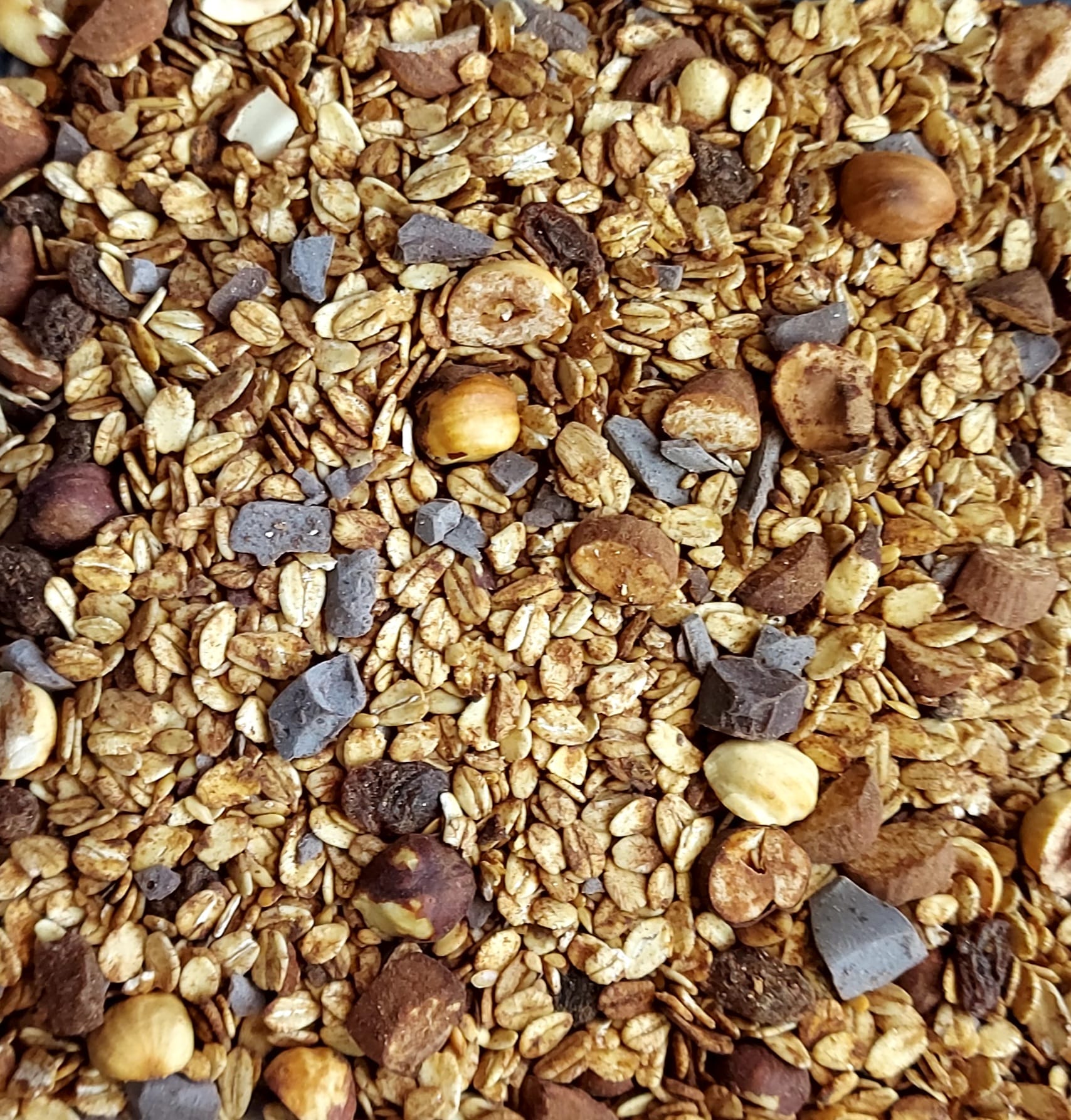 Granola Artesanal Chocolate Mistura de granola com aveia, pedaços de chocolate e avelãs