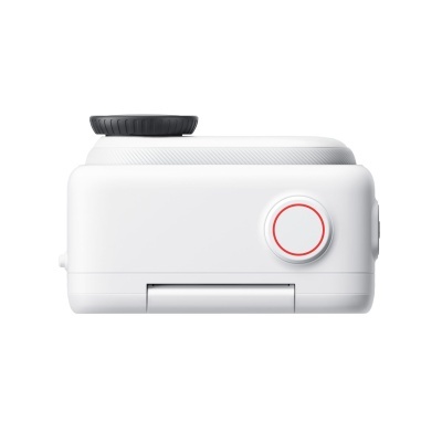 câmara compacta branca vista lateral com botão circular e roda preta