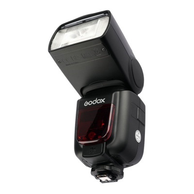 Flash de câmara fotográfica Godox preto com visor branco e detalhe vermelho