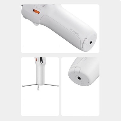 Dispositivo branco com texto 'hohem', botões laranja e apoio tripé