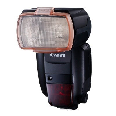 Flash externo Canon preto com caixa de luz laranja e plástico transparente