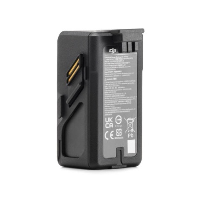 Bateria DJI preta com texto branco e símbolos em fundo branco
