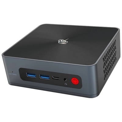 Computador compacto cinza escuro com topo preto e portas USB