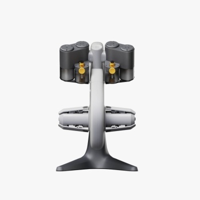 Suporte moderno para dispositivos em plástico cinzento, branco e preto com detalhes amarelos