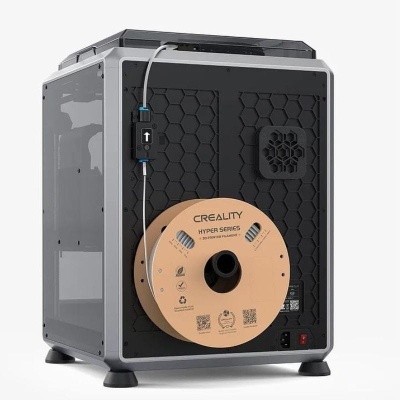 Impressora 3D Creality Hyper Series preta e cinza com rolo de filamento marrom