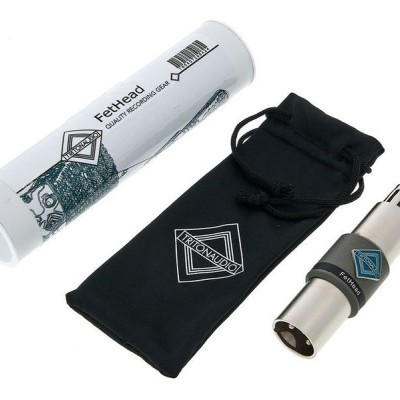 Preamplificador passivo FetHead em metal com saco preto e embalagem cilíndrica branca.