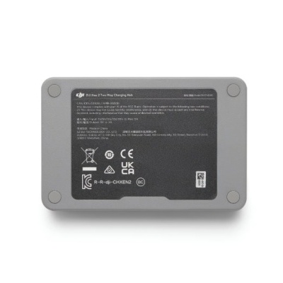 Base de carregamento DJI cinzenta com etiqueta preta e texto técnico