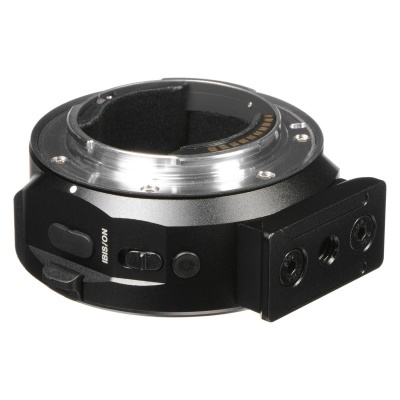 Adaptador de montagem para lente fotográfica preto com botões e texto IBISION