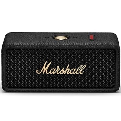 Coluna portátil Marshall preta com logotipo dourado e botões no topo