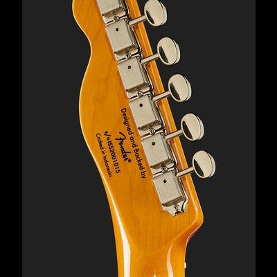 Cabeça de guitarra elétrica em madeira laranja com cravelhas cromadas e texto preto