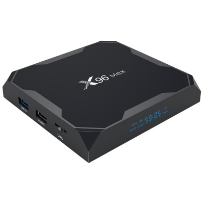 Aparelho X96 Max preto com ecrã digital azul e portas USB