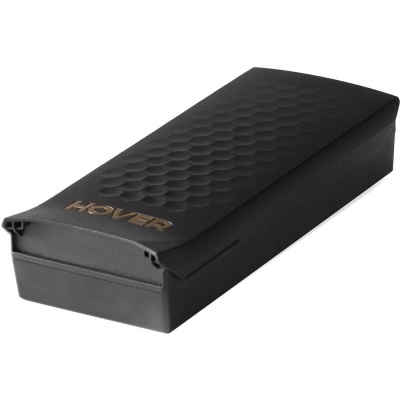 Caixa preta retangular texturizada com palavra HOVER em relevo dourado