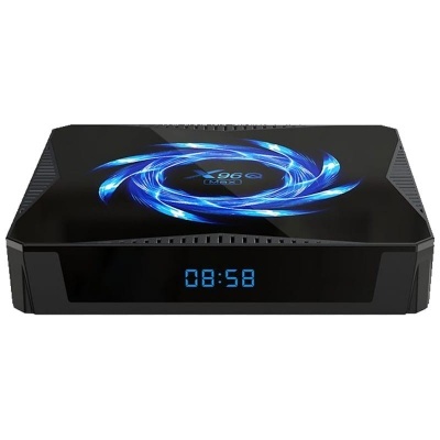 Receptor digital preto com painel luminoso azul mostrando hora e padrão circular azul no topo.