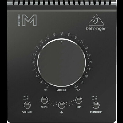 Painel frontal preto de equipamento áudio Behringer com botão de volume e botões de controlo.