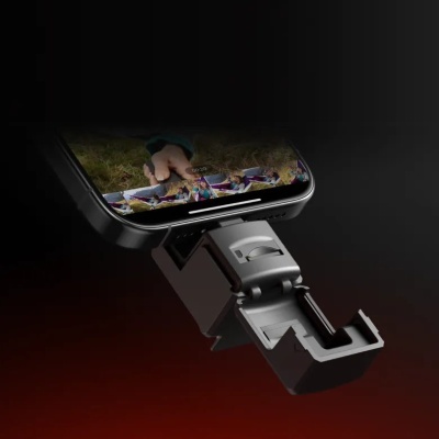 Suporte dobrável preto para smartphone com telemóvel exibindo imagem colorida