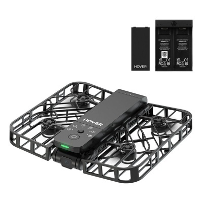 Drone quadricóptero preto com proteção e bateria destacável