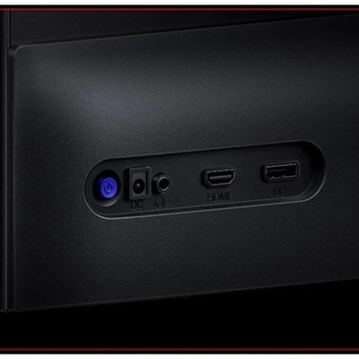 Portas e botão numa placa traseira preta de dispositivo eletrónico