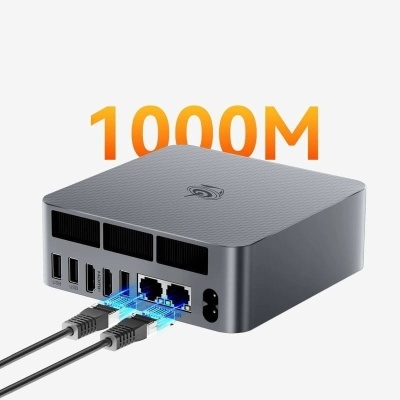 dispositivo compacto metálico cinza com portas USB e Ethernet com cabos conectados