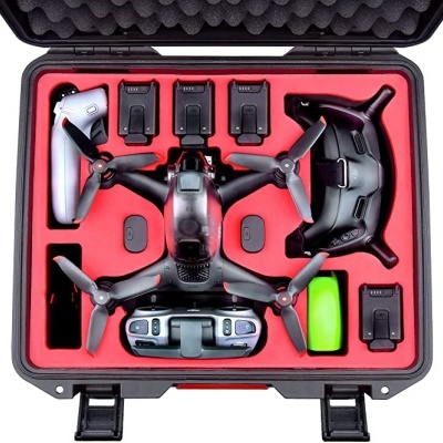 Dry case with drone, batteries, remote controller, VR goggles and accessories