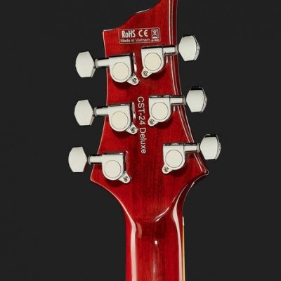Cabeça traseira de guitarra vermelha com tarraxas cromadas e textos CST-24 Deluxe e RoHS CE Made in Vietnam