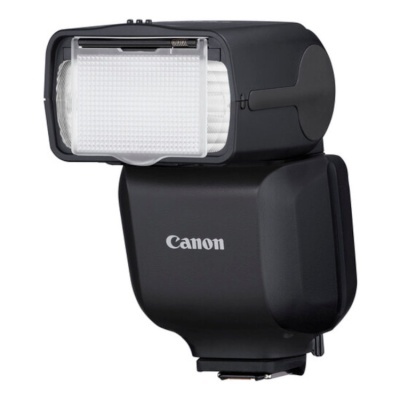 Flash externo preto para câmaras Canon com difusor branco.