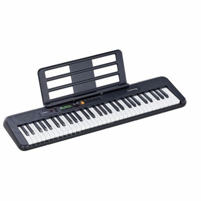 teclado musical eletrónico preto com suporte para partituras
