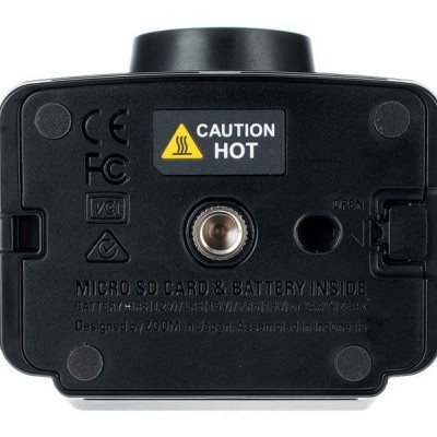 Base preta de dispositivo eletrônico com aviso de calor e texto sobre cartão micro SD e bateria