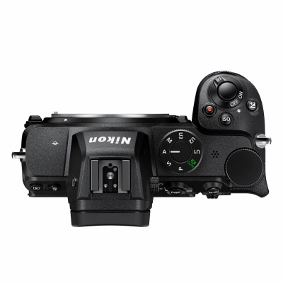 Câmara fotográfica Nikon preta vista de cima com botões e mostrador